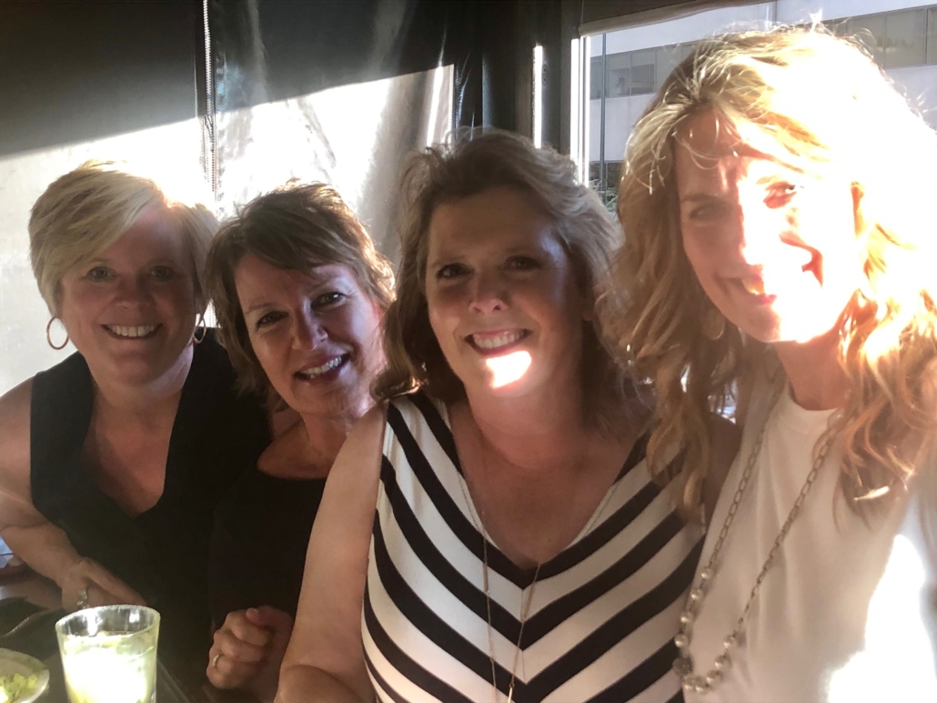 four court reporters pose together in Colorado